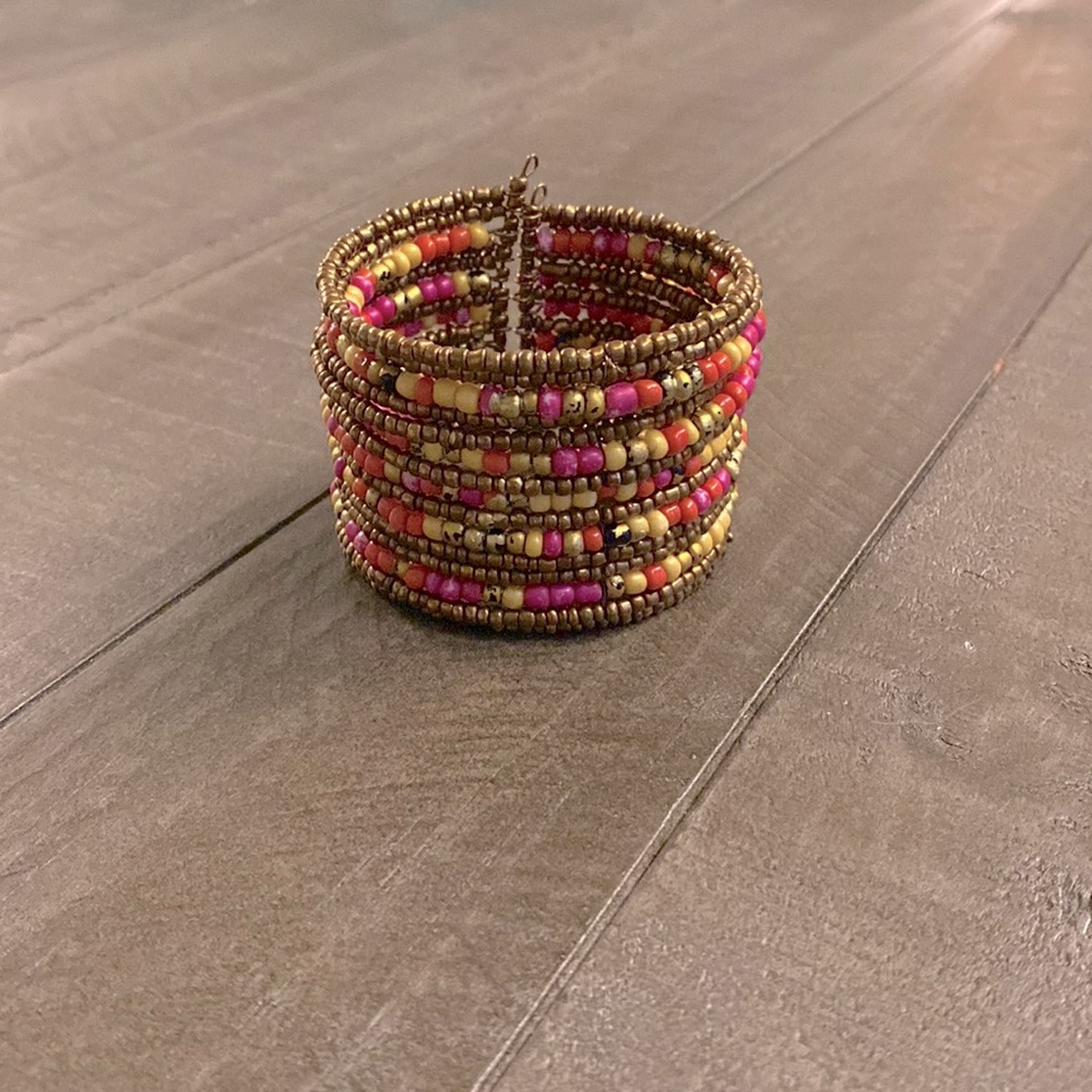 Yellow, pink and gold beaded bracelet